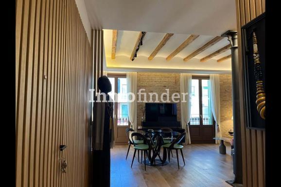 Perspectiva salon comedor piso en venta calle Muntaner